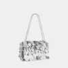 Bolso baguette brillante