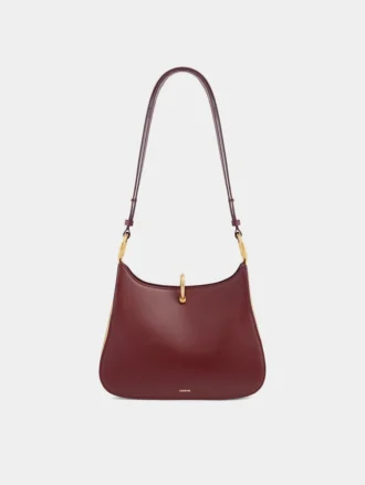 Bolso mediano de cuero con anillos