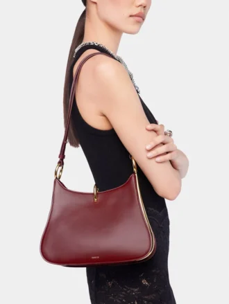 Bolso mediano de cuero con anillos