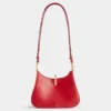 Bolso pequeño de cuero con anillas