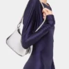 Bolso pequeño de cuero con anillas