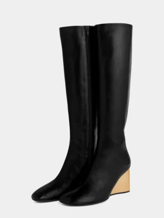 Botas de cuero doradas hasta la rodilla