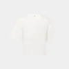 Camiseta blanca con piercing