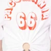 Camiseta estampada de algodón con detalle de piercing