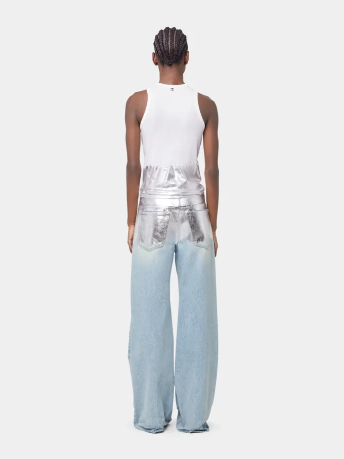 Camiseta sin mangas blanca con aberturas en punto acanalado