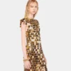 El icónico vestido dorado Sparkle Disc