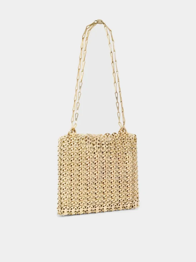 Icónico bolso dorado claro de 1969