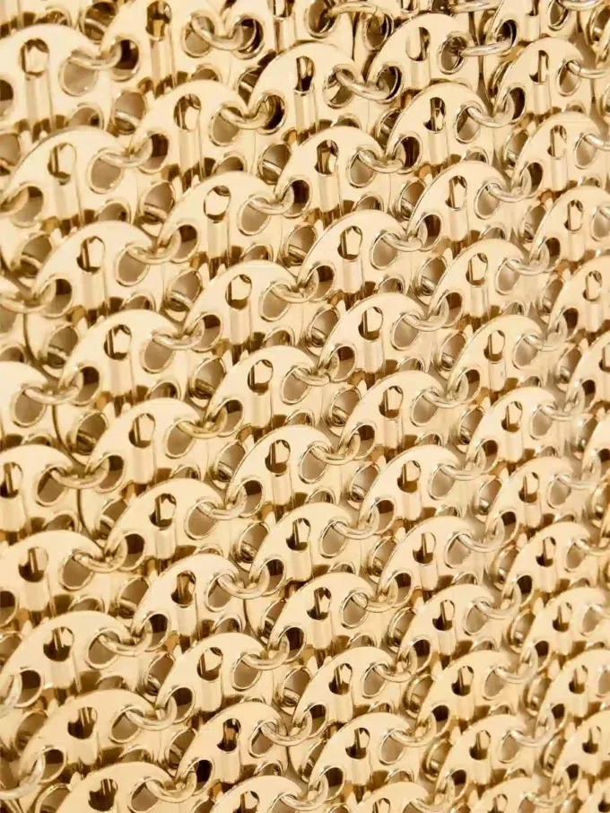 Icónico bolso dorado claro de 1969