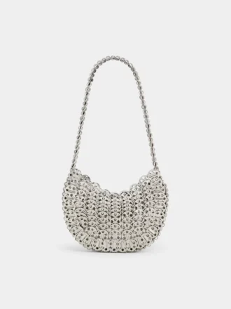 Icónico bolso Moon Bag de 1969 en color plateado