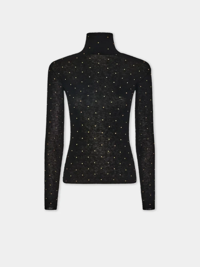 Jersey de cuello alto de lana que se adapta como una segunda piel
