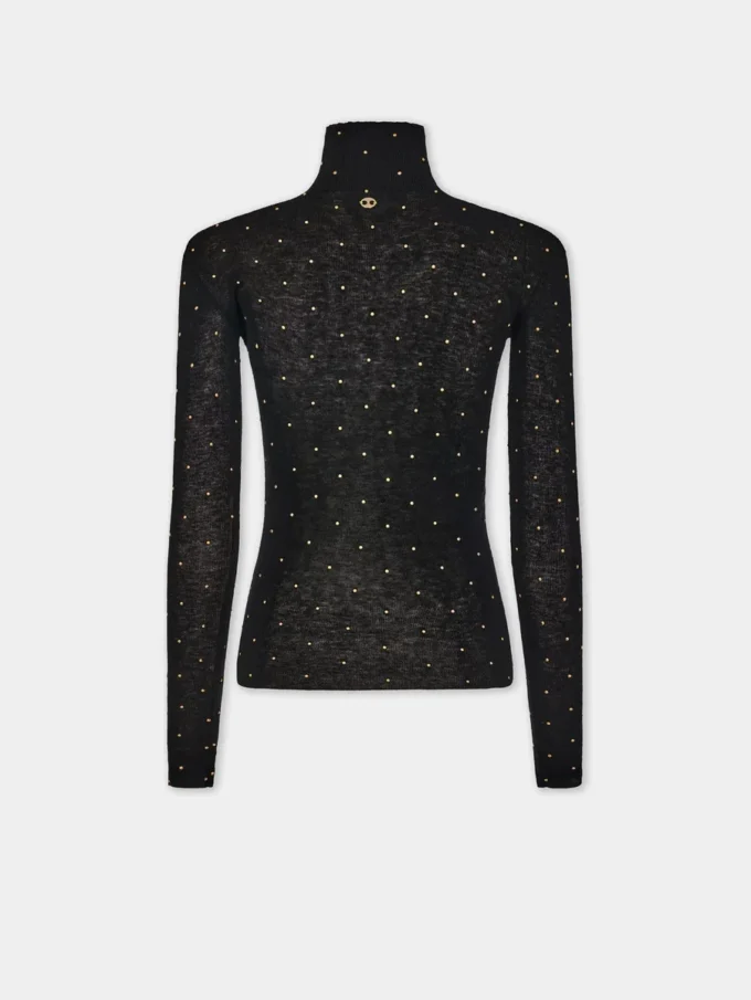 Jersey de cuello alto de lana que se adapta como una segunda piel