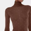 Jersey de cuello alto de lana que se adapta como una segunda piel
