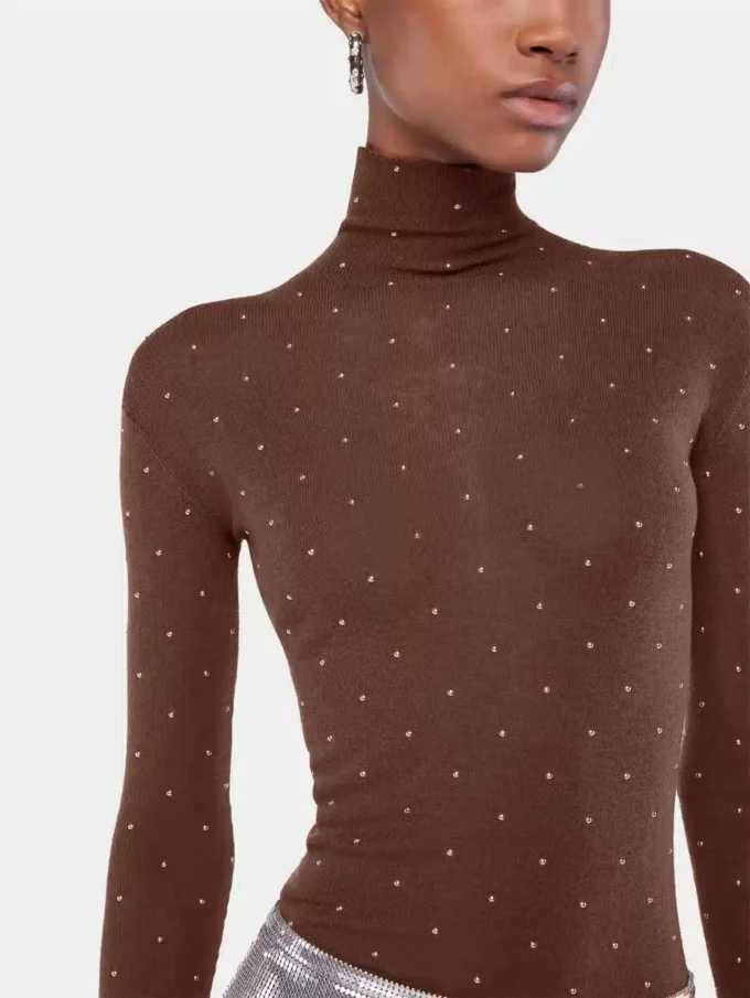 Jersey de cuello alto de lana que se adapta como una segunda piel