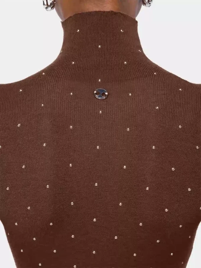 Jersey de cuello alto de lana que se adapta como una segunda piel
