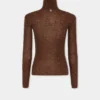 Jersey de cuello alto de lana que se adapta como una segunda piel