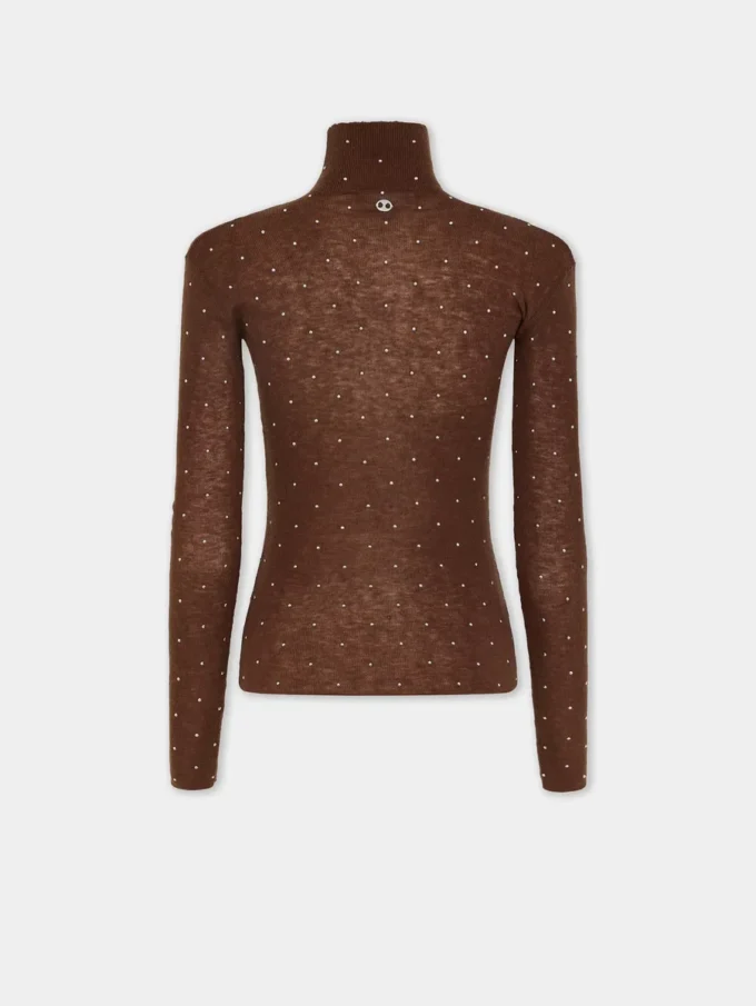 Jersey de cuello alto de lana que se adapta como una segunda piel