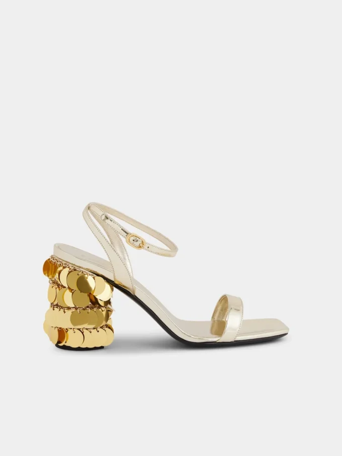 Sandalias doradas con tacones de disco Sparkle