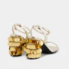 Sandalias doradas con tacones de disco Sparkle