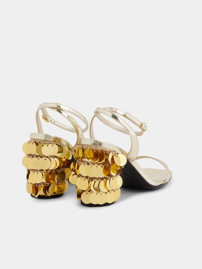 Sandalias doradas con tacones de disco Sparkle
