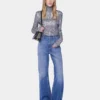 Top de cuello alto con lentejuelas