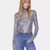 Top de cuello alto con lentejuelas