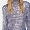 Top de cuello alto con lentejuelas