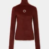 Top de cuello alto de punto cepillado.