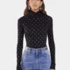 Top negro adornado con cristales en jersey segunda piel.