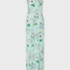 Vestido con estampado floral y detalles de cadenas