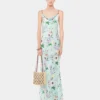 Vestido con estampado floral y detalles de cadenas