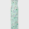 Vestido con estampado floral y detalles de cadenas