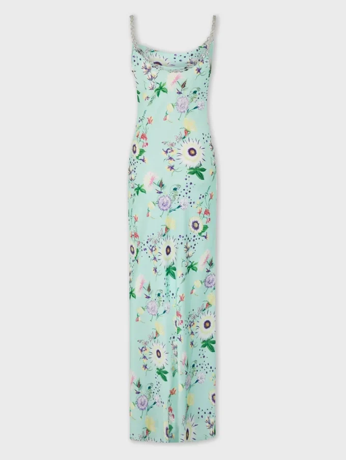 Vestido con estampado floral y detalles de cadenas