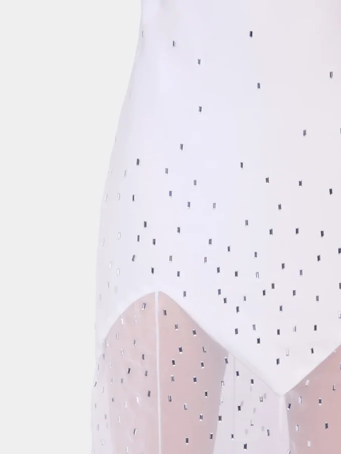Vestido largo blanco sin mangas de muselina y satén