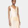 Vestido largo sin mangas de color crema en jersey